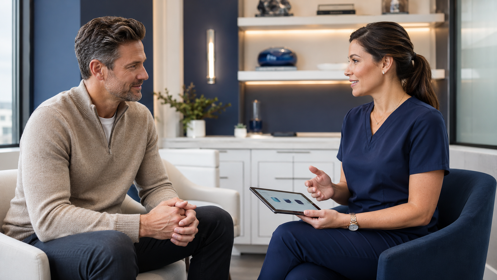 Male patient speaking with a provider who is using CLR RX during the consultation